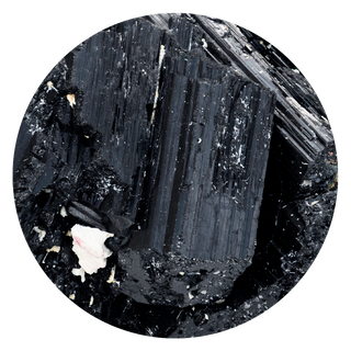 Black Tourmaline Meaning: Protection, Grounding, and the Container for Magick