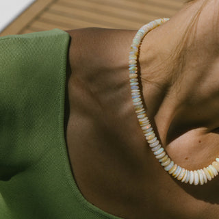 Close-up of raw Ethiopian white opal beads showing natural texture and color variations