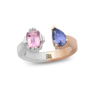 Open-set pink tourmaline and sapphire toi et moi ring in 14k rose and white gold, product shot.
