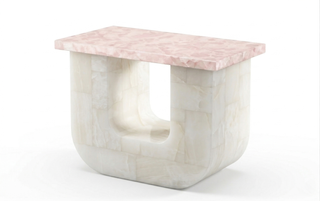 Rose and white onyx inlaid console table with fluted wood base, product shot on white.

