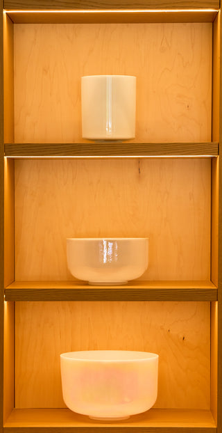 Three-tier atelier display with Saint Germain sky bowl as centerpiece, full collection view.