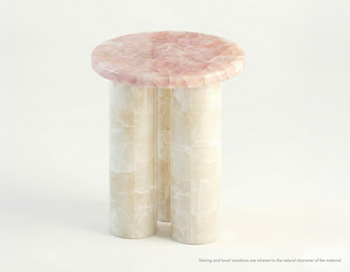Rose quartz and white onyx side table with triple column base, product shot on white.